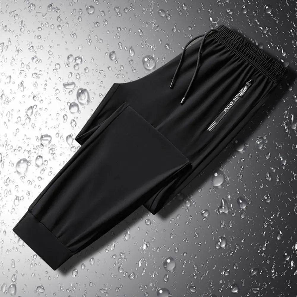 Men's Summer Ice Silk Pants Mesh Quick drying Ankle-banded Breathable Casual Thin Pants Loose Elastic Pants Sports Trousers